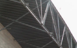 Net installed to exclude pigeons from steel beams