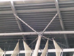 Underside view of the metal canopy that pigeons had taken over
